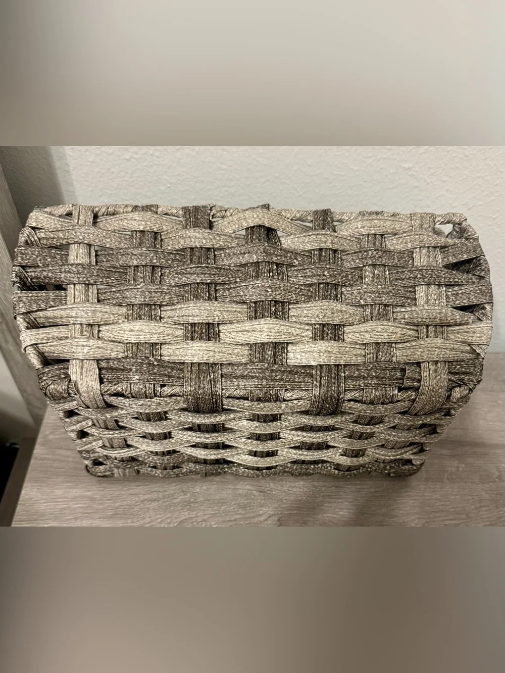 Allen +Roth . This small, grey decorative basket by allen + roth is made of poly